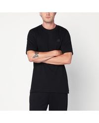 Moncler - T-shirt in cotone nera con patch logo - Lyst