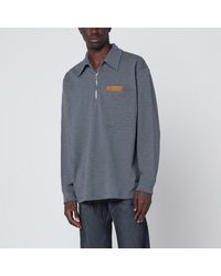 Bottega Veneta - Polo grigia scura con dettaglio in intrecciato - Lyst