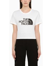 The North Face - T-shirt cropped bianca in cotone con logo - Lyst