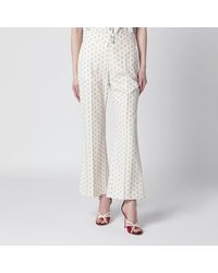 Valentino - Ivory Trousers With Floral Pattern - Lyst