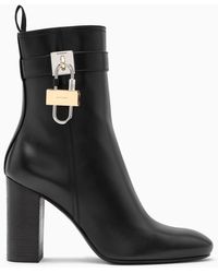 Givenchy stivaletto Prue con fibbie e borchie in pelle di vitello