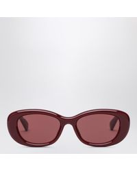 Gucci - Occhiali da sole ovali color burgundy - Lyst