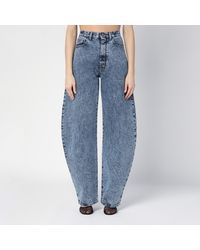 Alaïa - Rounded Denim Jeans - Lyst