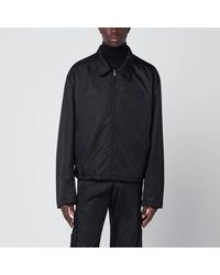 Prada - Giacca con zip nera in re-nylon - Lyst