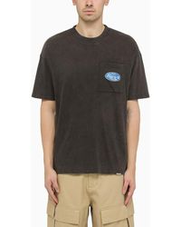 Represent - T-shirt nera effetto slavato in cotone con logo - Lyst