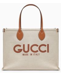 Gucci - Borsa shopping in canvas con logo - Lyst