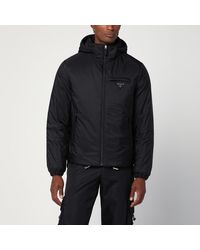 Prada - Giacca imbottita nera in re-nylon - Lyst