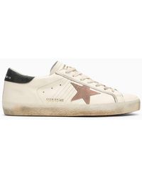 Golden Goose - Sneaker bassa super-star bianca/rosa/nera - Lyst