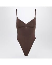 Skims - Cocoa Seamless Sculpt Thong Bodysuit - Lyst