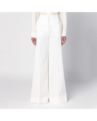 Stella McCartney - Cream-coloured Wool Flared Trousers - Lyst