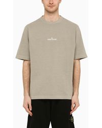 Stone Island - T-shirt color polvere in cotone con logo - Lyst