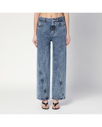 Alaïa - Twisted Stonewashed Denim Jeans - Lyst