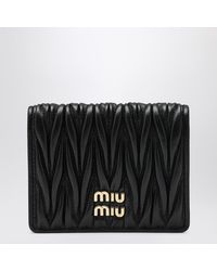 Miu Miu - Schwarze Nappa-Leder Gesteppte Geldbörse - Lyst