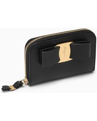 Ferragamo - Vara Black Leather Zip Around Wallet With Bow - Lyst