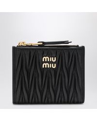 Miu Miu - Kleines Schwarzes Portemonnaie Aus Gestepptem Nappaleder - Lyst