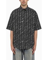 Balenciaga - Camicia button-down nera in cotone con stampa logo - Lyst