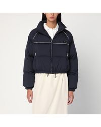 Miu Miu - Blaue Daunenjacke Mit Logo - Lyst