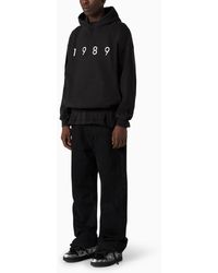 パーカー・フーディ 1989 STUDIO 1989 logo hoodie black 1989 STUDIO ロゴ パーカー | ブラック | FARFETCH JP
