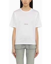 Saint Laurent - T-shirt girocollo bianca con stampa logo - Lyst