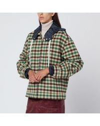 Miu Miu - Giacca in lana check con cappuccio in nylon - Lyst
