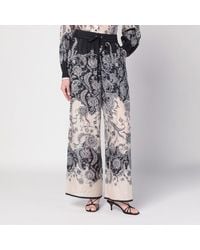 Zimmermann - Pantalone rhiannon crema con stampa fantasia - Lyst