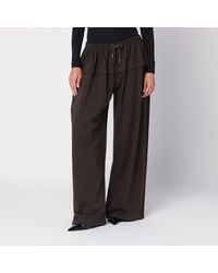 Alaïa - Peplum Trousers - Lyst