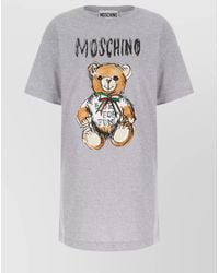 Moschino - Cotton Ribbed Oversized Printed Mini T Shirt Dress - Lyst