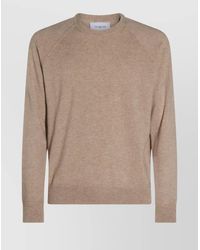 Malo - Crew Neck Sweater With Raglan Sleeves And Ribbed Hem - Lyst