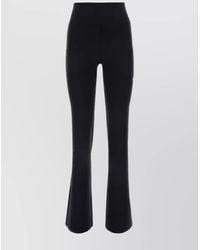 Balenciaga - Logo Print Flared Trousers - Lyst