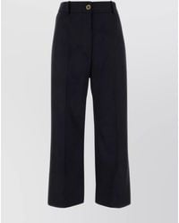 Patou - Flared High-Waisted Wool Blend Trousers - Lyst