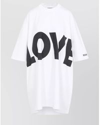 オールインワン・サロペット Moschino Oversized White Dress With Graphic Elements Moschino Oversized White Dress With Graphic Elements White
