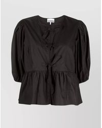 Ganni - Cotton Peplum Top With Bow And Flounces - Lyst