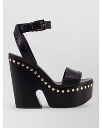 Givenchy - Studded Leather Wedge Sandals - Lyst
