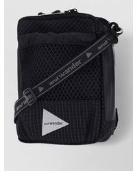 and wander - Crossbody Clutch Bag Adjustable Strap Detail - Lyst