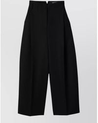 Jacquemus - Virgin Wool High-Rise Flared 7/8 Tailored Trousers - Lyst