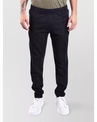 Moschino - Trousers With Elastic Waistband And Ribbed Cuffs - Lyst