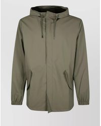 Rains - Long Sleeve Hooded Coat With Drawstring Hem - Lyst