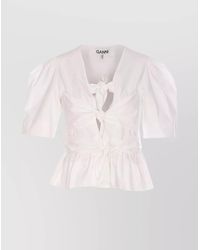 Ganni - Organic Cotton V-Neck Short-Sleeve Tie-Front Blouse - Lyst