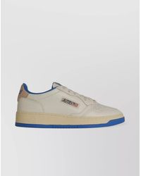 Autry - Leather Sneakers With Contrast Sole And Perforated Toe Box - Lyst