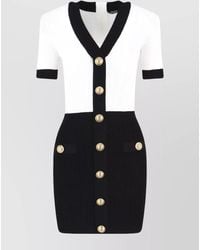 Balmain - Viscose Slim-Fit Knitted V-Neck Short-Sleeve Mini Dress - Lyst