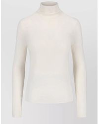 Lisa Yang - Long Sleeve Turtleneck Ribbed Knit Top - Lyst