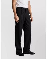 Saint Laurent - Wool Flannel Mid-Rise Straight-Leg Pleated Trousers - Lyst