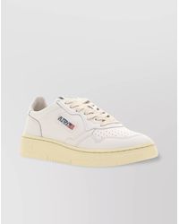 Autry - Low-Top Sneakers With Contrast Sole And Perforated Detailing - Lyst