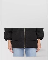 Patou - Quilted Parka With High Collar And Hood - Lyst