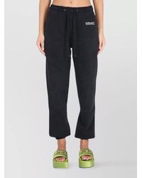 Versace - Jogging Pants With Logo - Lyst