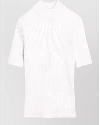 Courreges - Ribbed Turtleneck Short-Sleeve Knitted Top - Lyst