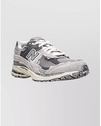 New Balance - Paneled Low-Top Sneakers - Lyst