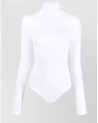 Wolford - Cotton-Blend Fine-Ribbed High-Neck Long-Sleeve Bodysuit - Lyst