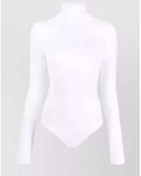 Wolford - Cotton-Blend Fine-Ribbed High-Neck Long-Sleeve Bodysuit - Lyst