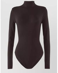 Wolford - Seamless Slim-Fit Turtleneck Long-Sleeve Bodysuit - Lyst